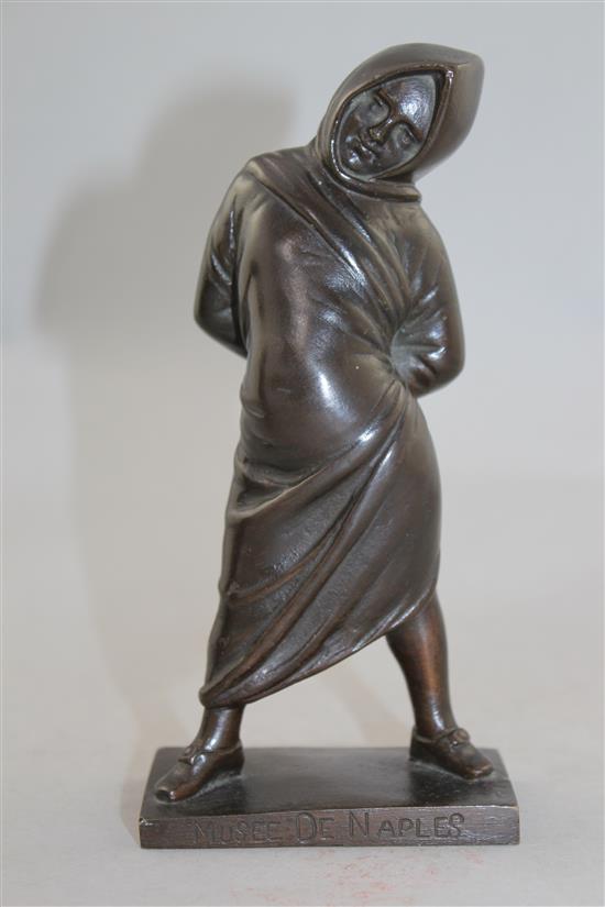 A small Italian patinated bronze of a figure standing in a hooded cloak, 6.75in.